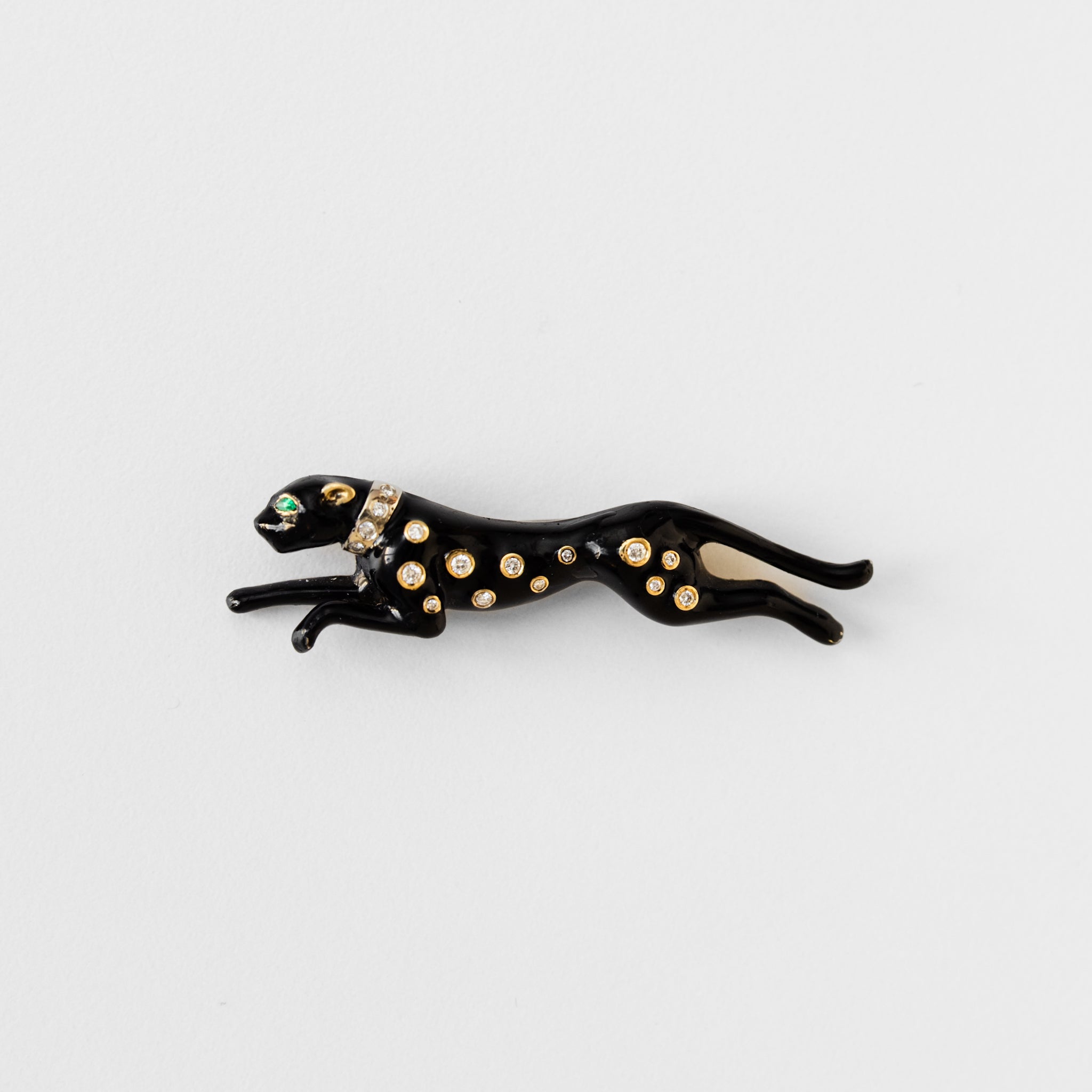 Broche panthère André VASSORT en or jaune et émail noir