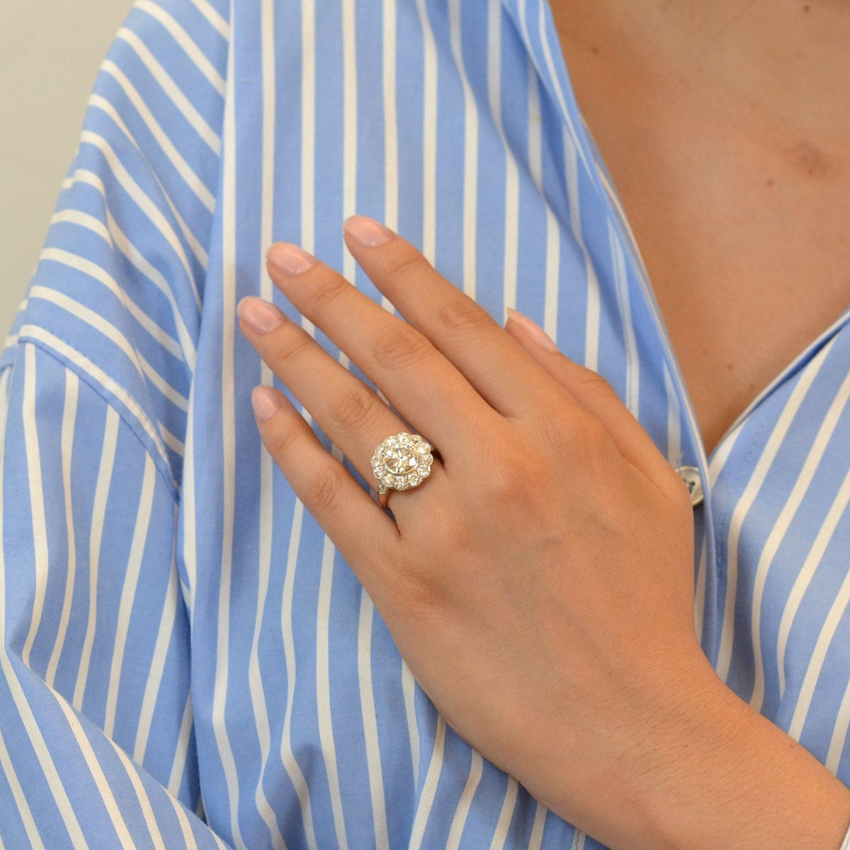 Bague Marguerite en or rose, platine et diamants