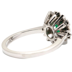Bague Entourage en or blanc, émeraude et diamants