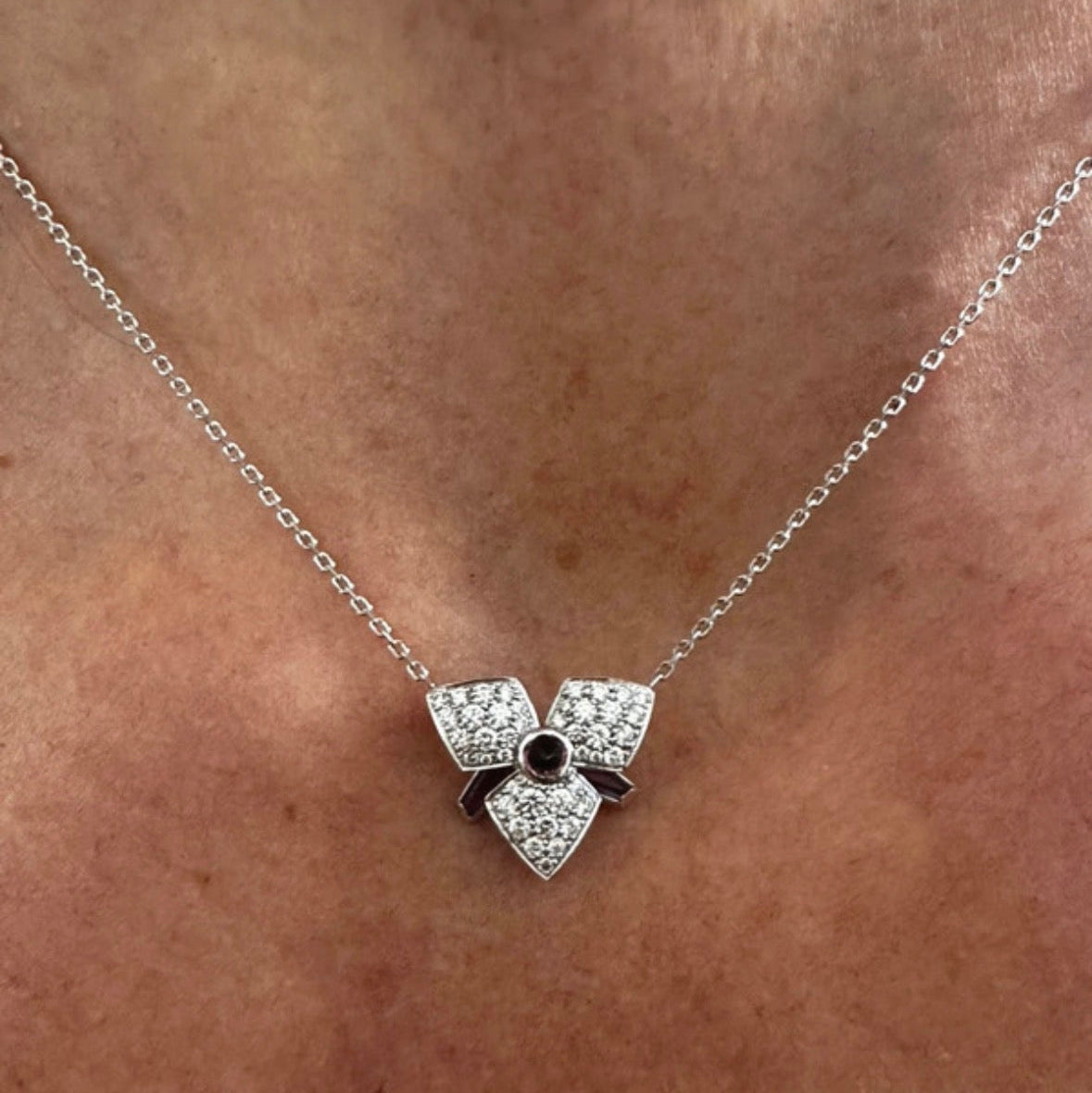 Necklace Cartier "Caresse d'Orchidée" in white gold and diamonds.