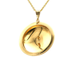 Pendentif en or jaune et rubis