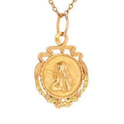 Médaille en or rose et or vert