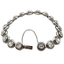Bracelet en or blanc, argent et diamants