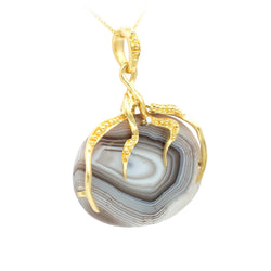 Pendentif en or jaune, agate et diamant