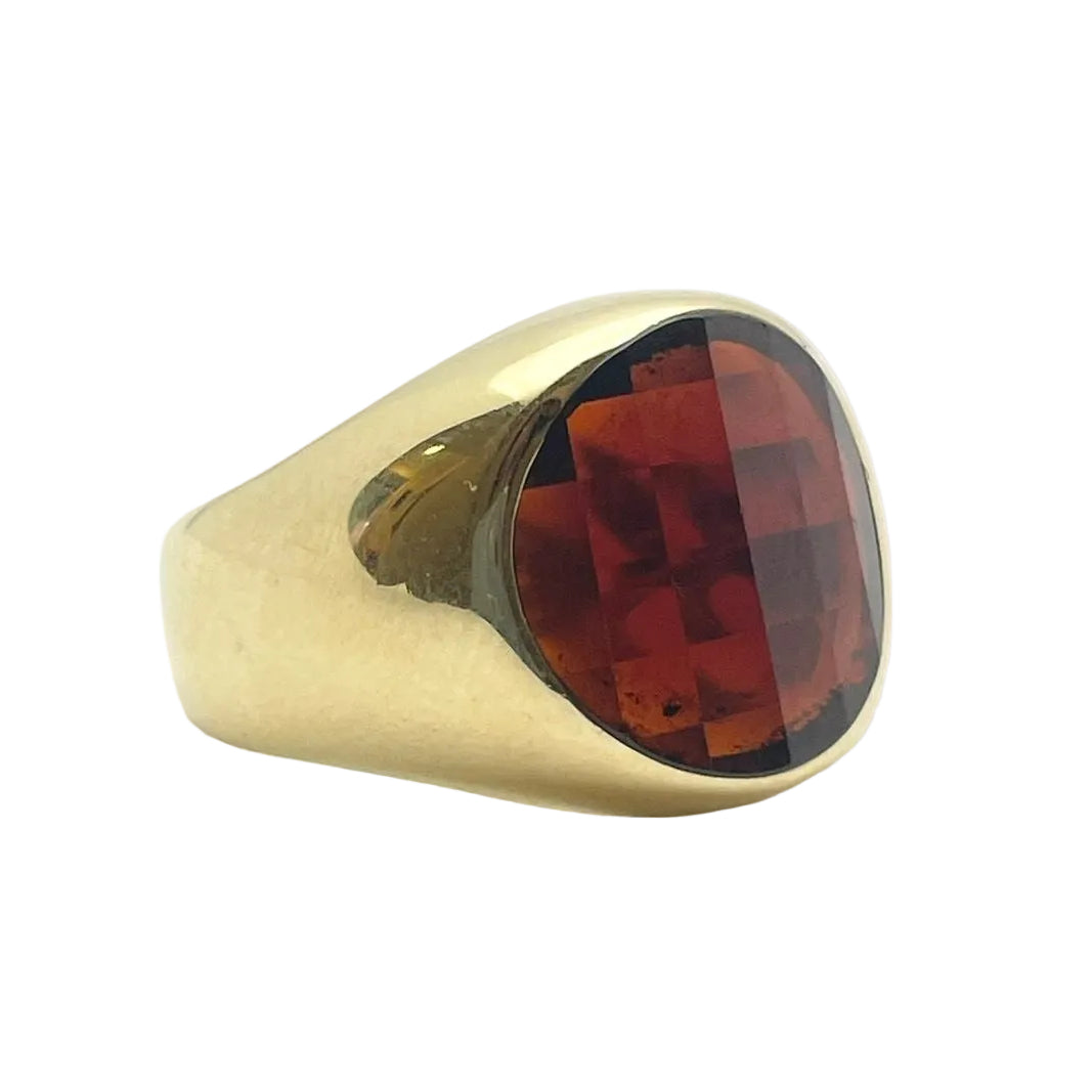 Bague Chevalière POMELLATO en or jaune et grenat