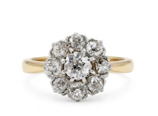 Bague Marguerite en or jaune, platine et diamants