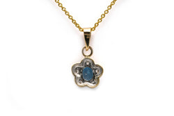 Pendentif en or blanc, or jaune, topaze et diamants