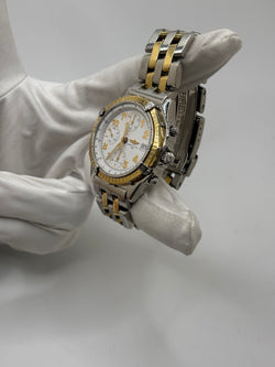 Montre Breitling Chronomat en or et acier