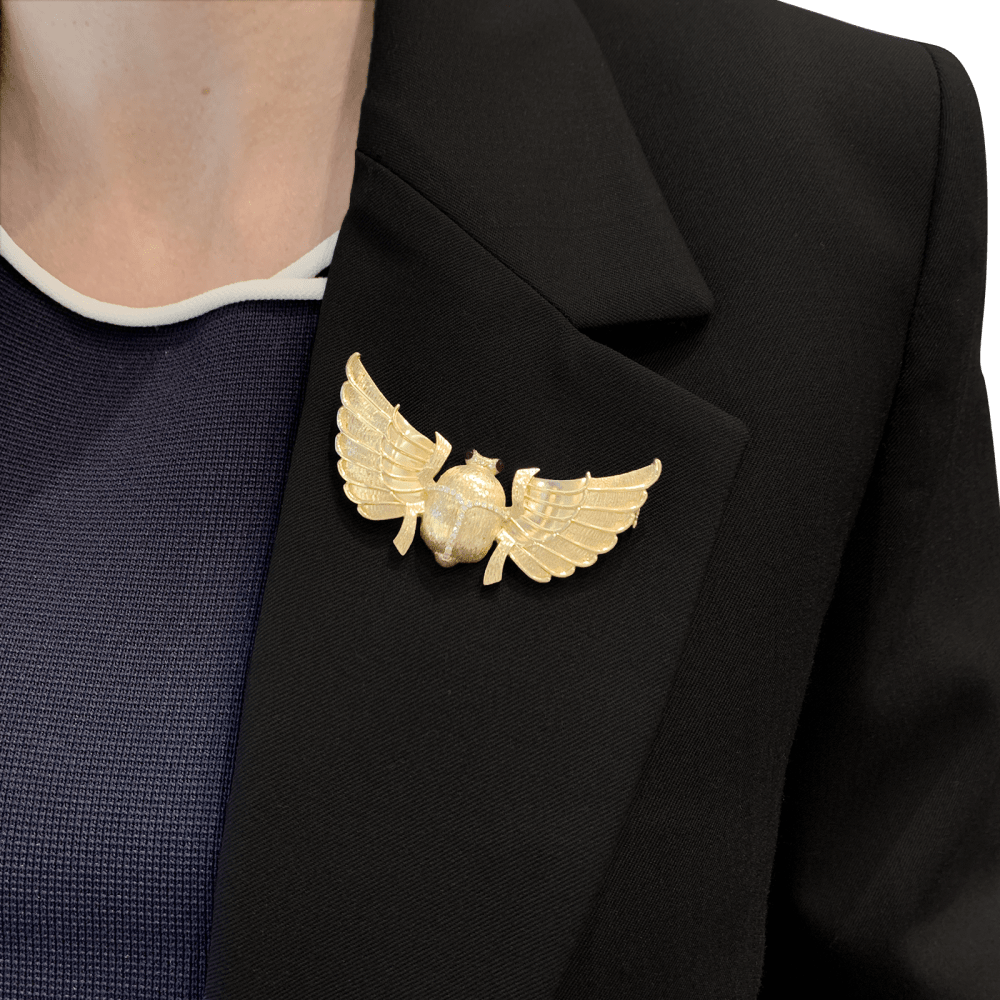 Broche "Scarabée" en or jaune, diamants et rubis.