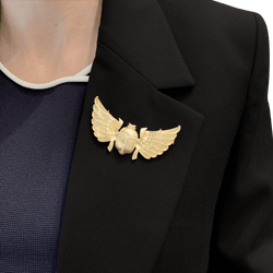 Broche "Scarabée" en or jaune, diamants et rubis.