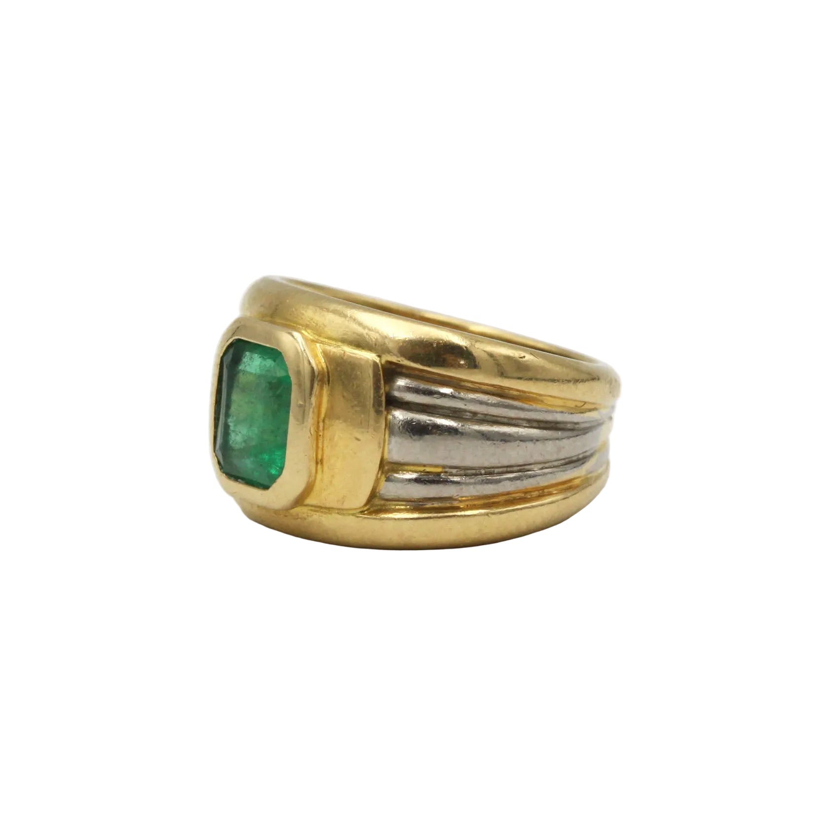 Bague Bandeau en or blanc, or jaune et émeraude