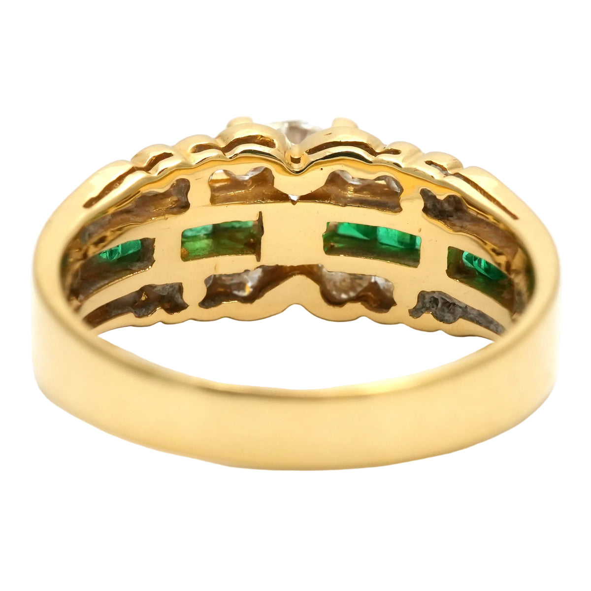 Bague Bandeau en or jaune, émeraudes et diamants