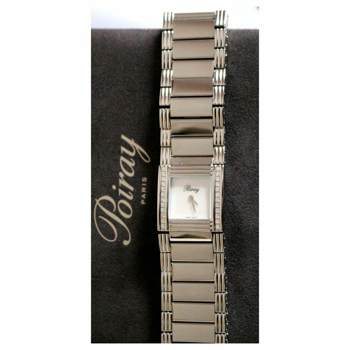 Montre POIRAY "Ma Première Manchette" en acier, nacre, quartz et diamants