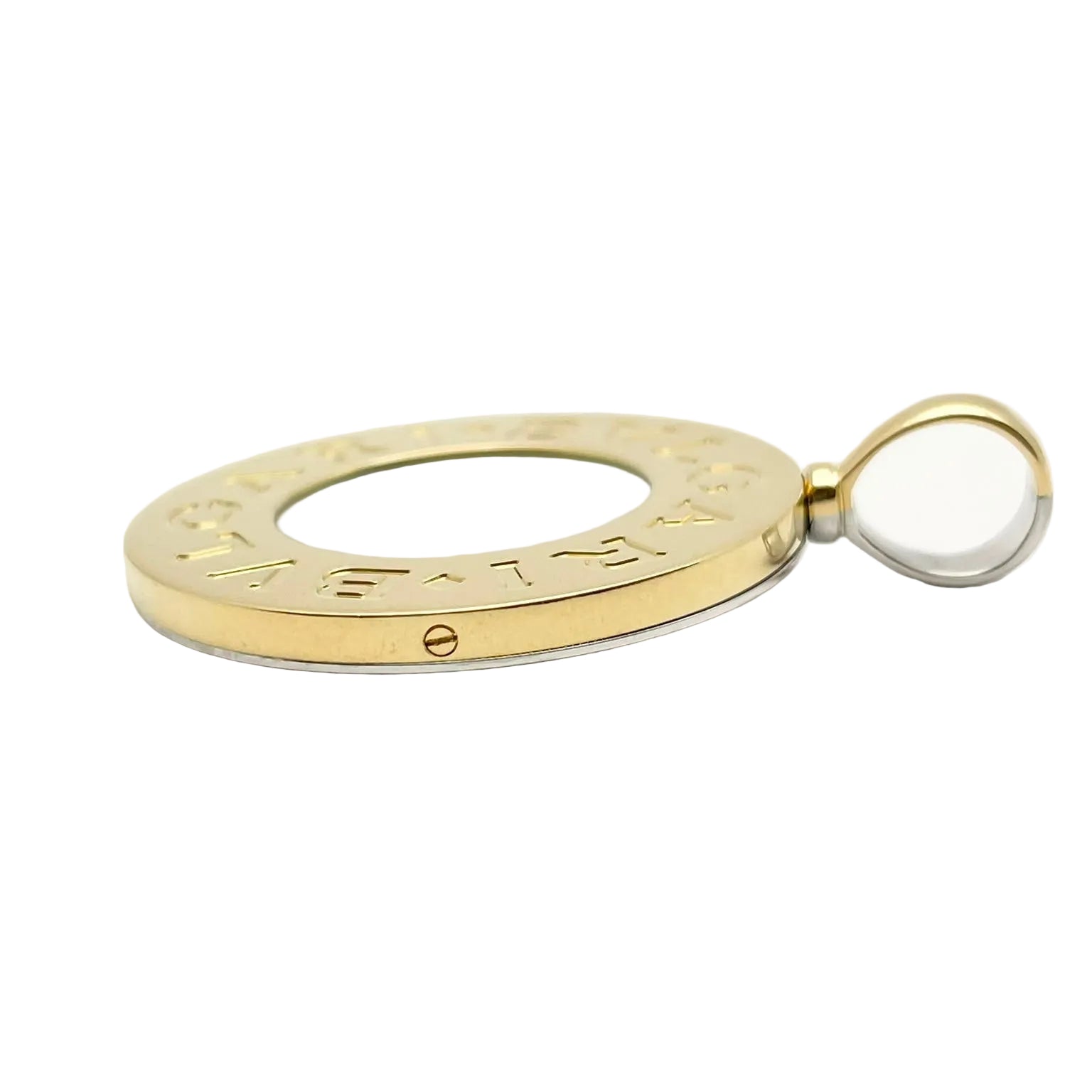 Pendentif BULGARI en or blanc, or jaune, nacre et onyx