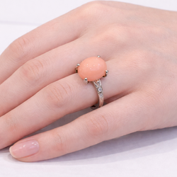 Bague Solitaire en platine, corail et diamants