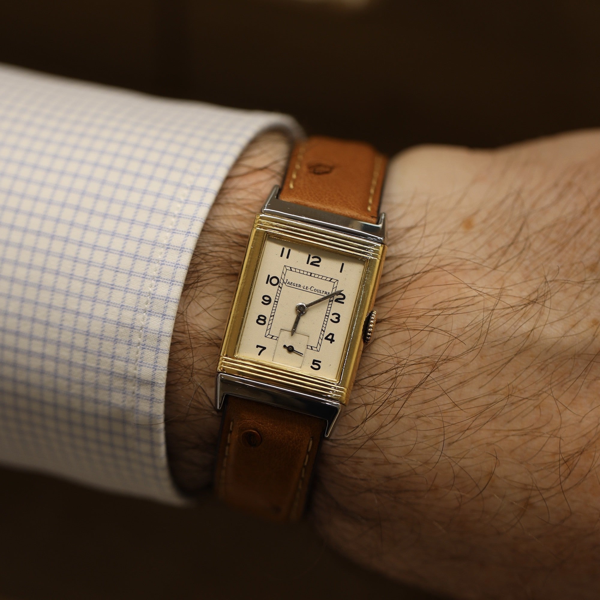 Montre JAEGER-LECOULTRE "Reverso" en or jaune, acier et cuir