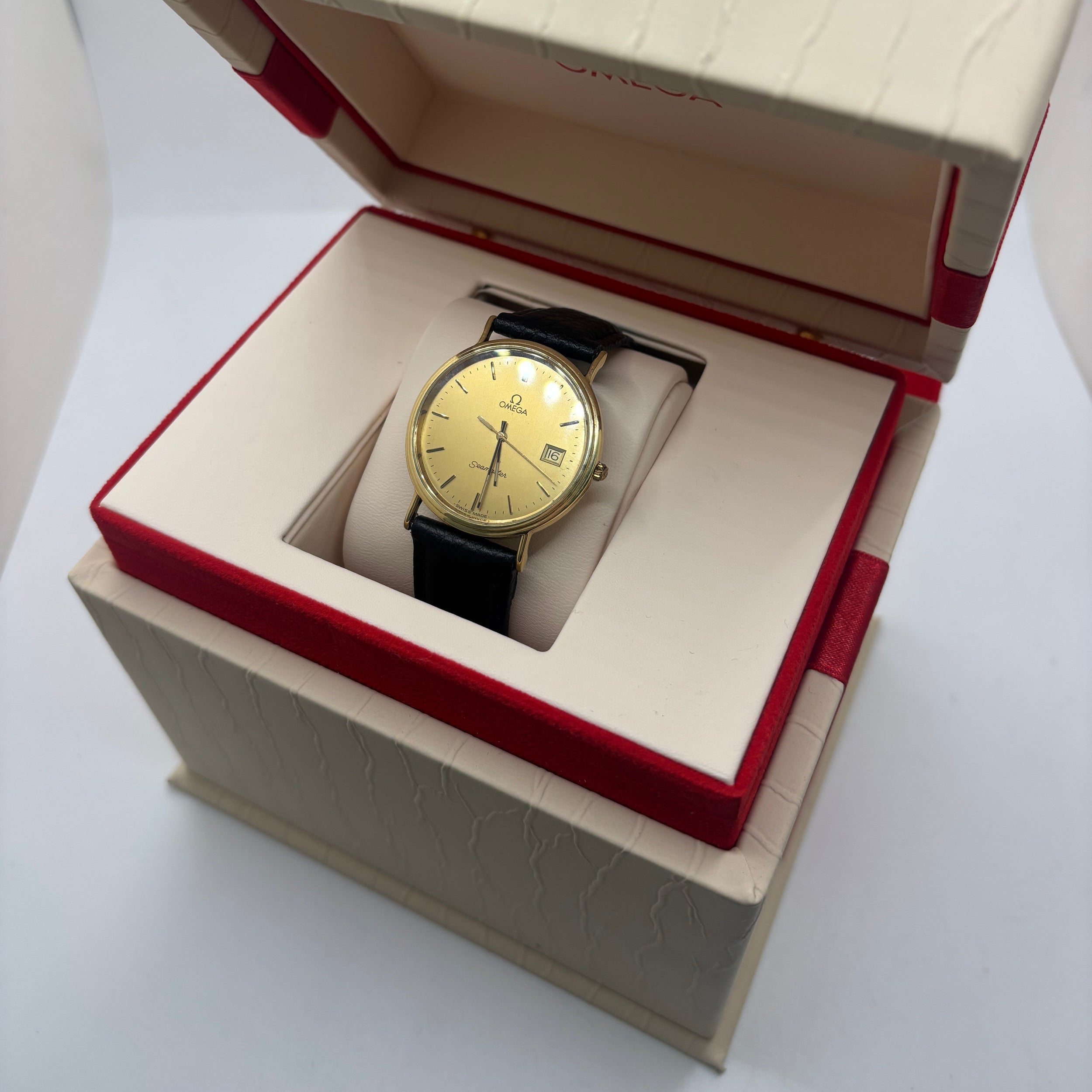 Montre OMEGA "Seamaster" en or jaune et cuir