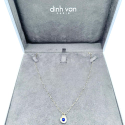 Collier Pendentif DINH VAN "Menottes R10" en or jaune et lapis lazuli