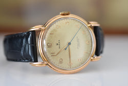 Montre ROLEX "Chronomètre" en or rose, acier et cuir