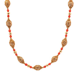Collier en or jaune et perles de corail
