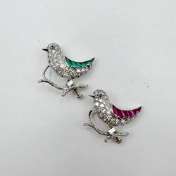 Deux broches "Oiseaux" en or blanc et platine