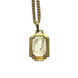 Médaille en or jaune et nacre