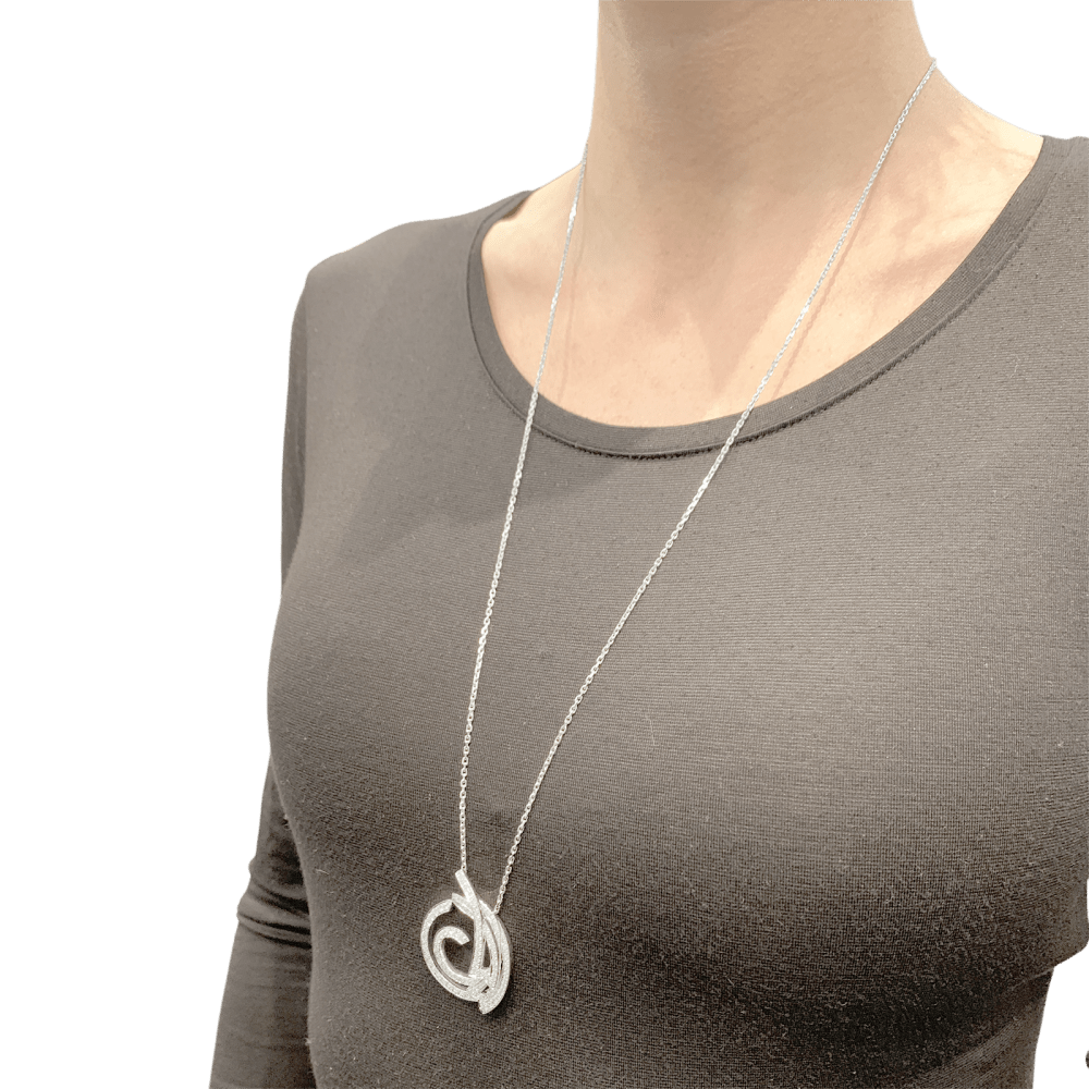 Sautoir Van Cleef & Arpels, "Contes d'Hiver", or blanc et diamants.