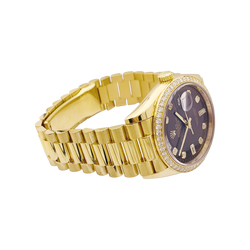 Montre Rolex, "Oyster Perpetual Day-Date", or jaune, diamants.