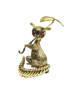 Broche en or champagne et rubis