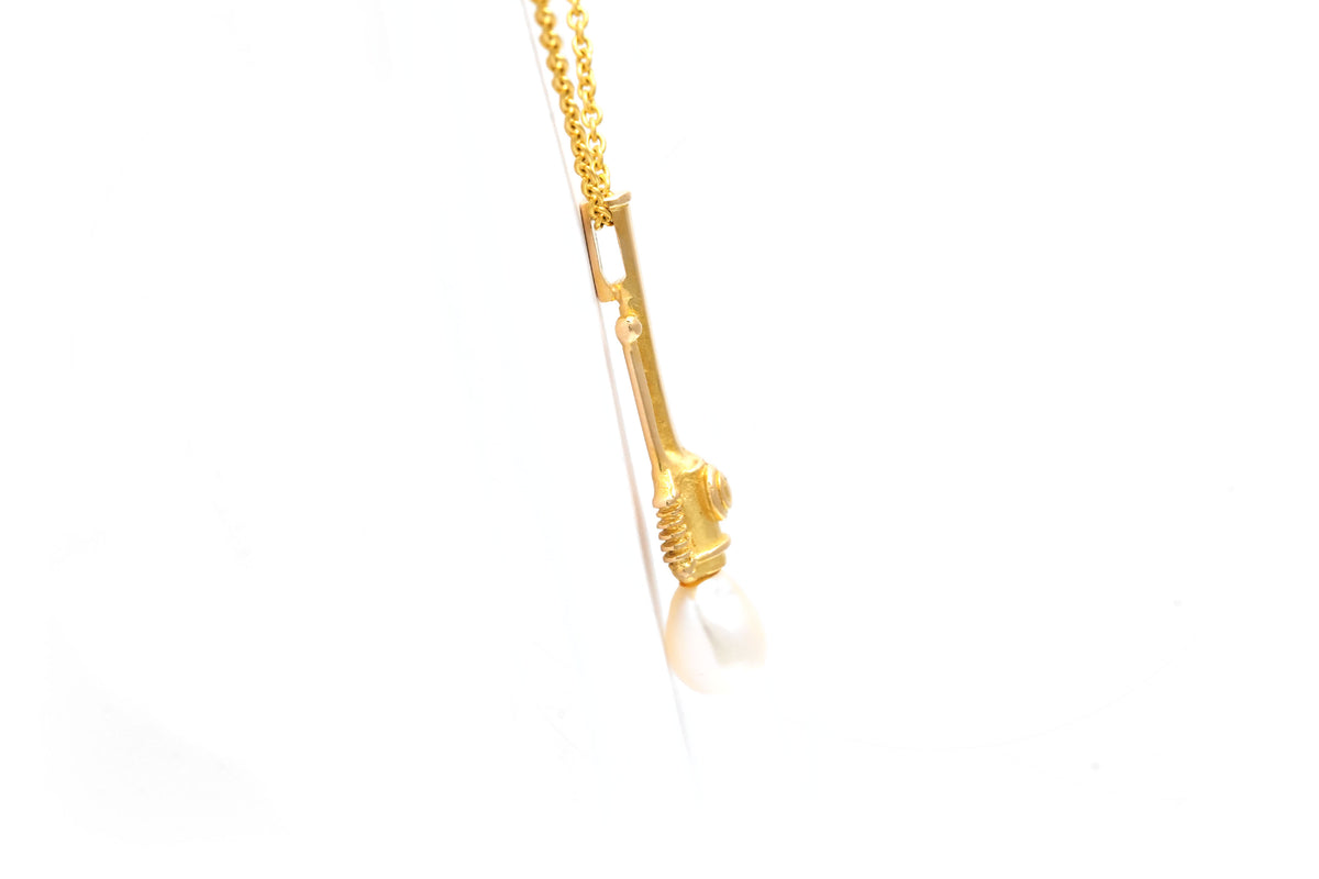 Pendentif en or jaune et perle