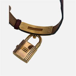 Montre HERMÈS Kelly en métal plaqué or et cuir