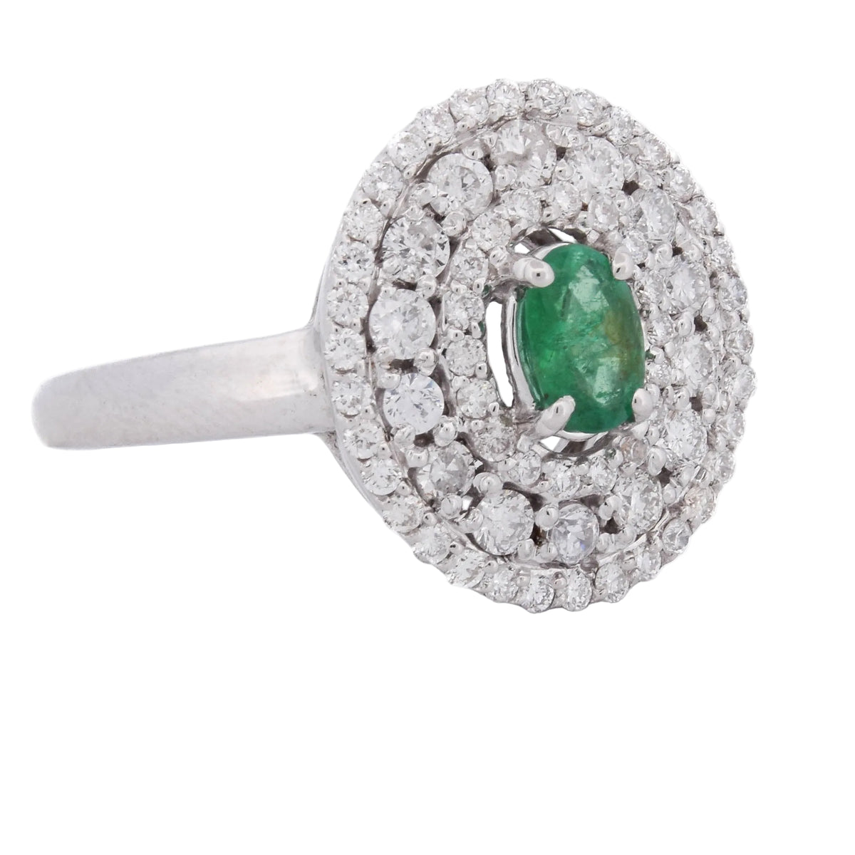 Bague Entourage en or blanc, émeraude et diamants
