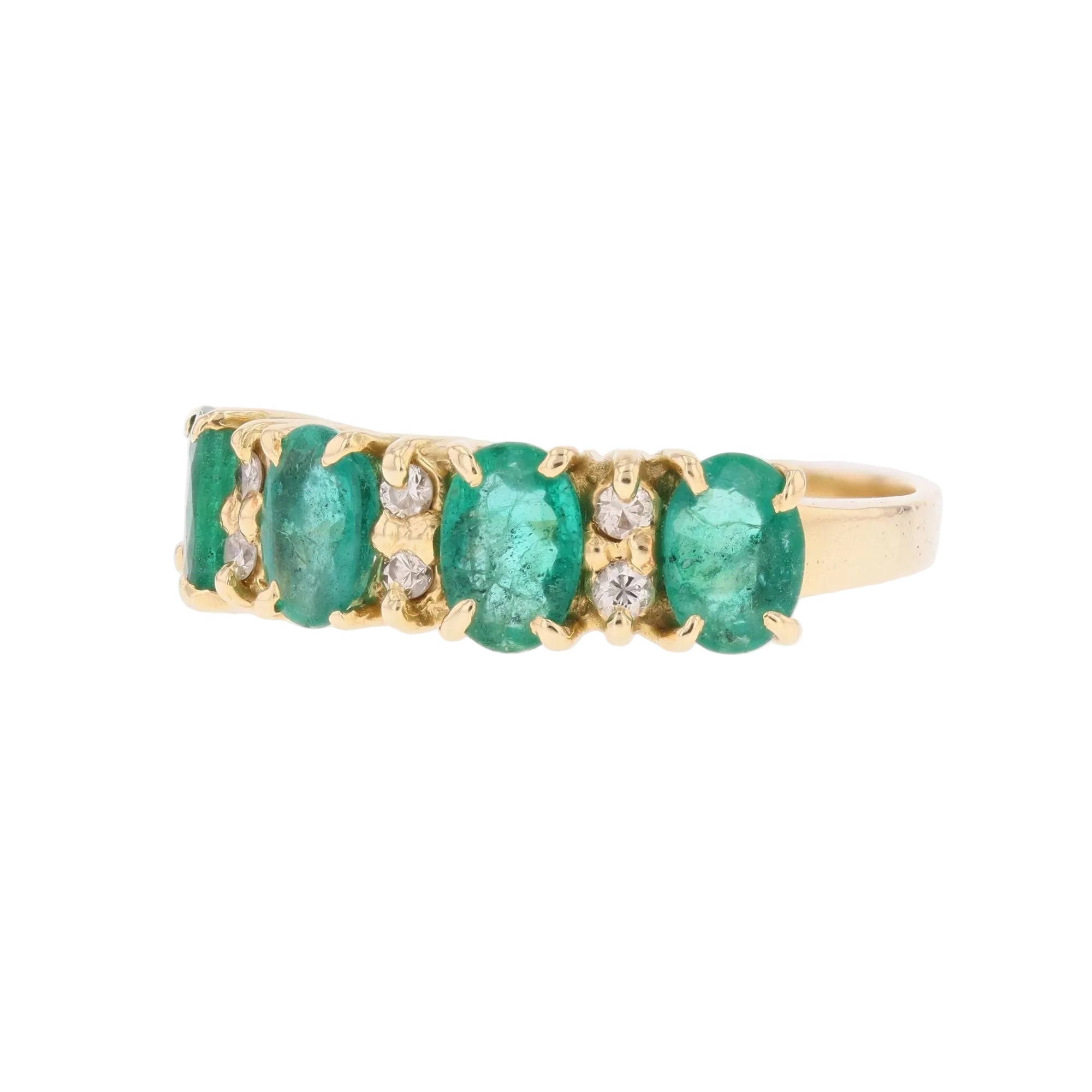 Bague Jarretière en or jaune, émeraudes et diaamnts