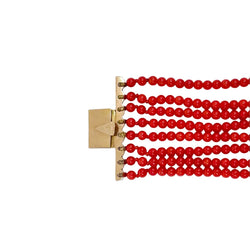 Bracelet en or jaune et perles de corail