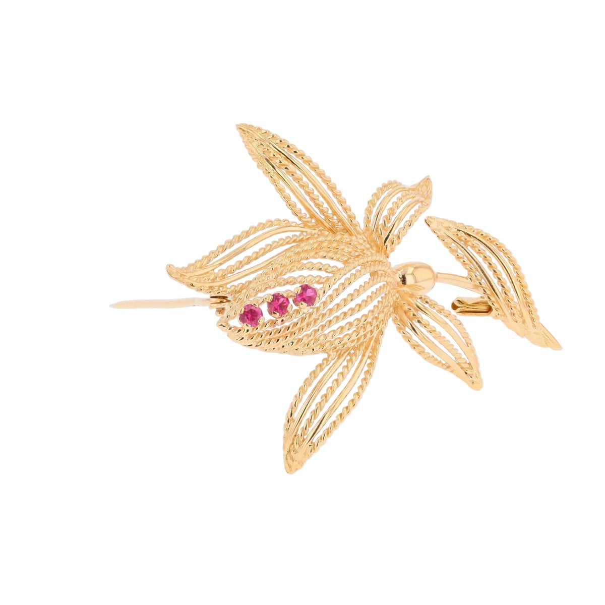Broche Épingle en or jaune et rubis