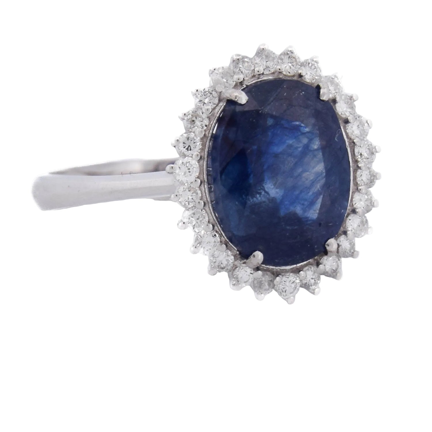Bague Entourage en or blanc, saphir et diamants