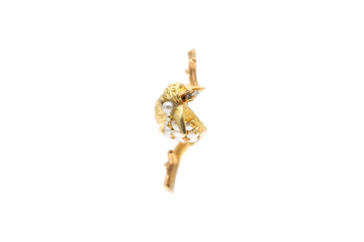 Broche Épingle en or jaune, perles et rubis