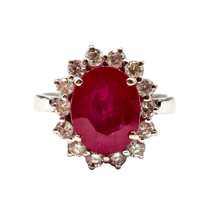 Bague Entourage en or blanc, rubis et diamants