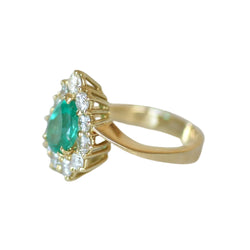 Bague Entourage en or jaune, émeraude et diamants