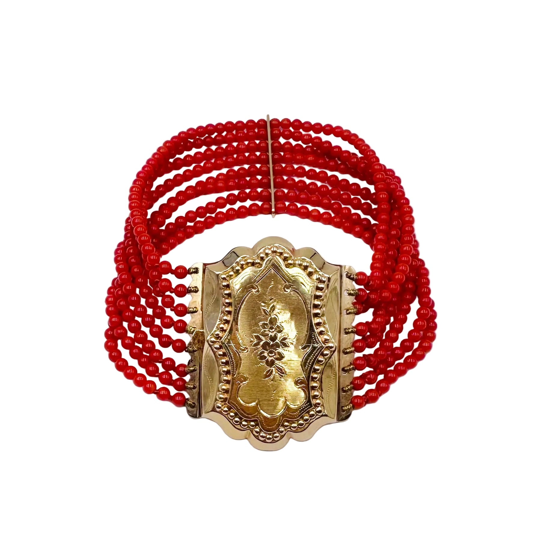 Bracelet en or jaune et perles de corail