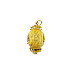 Médaillon en or jaune, perles et émeraudes