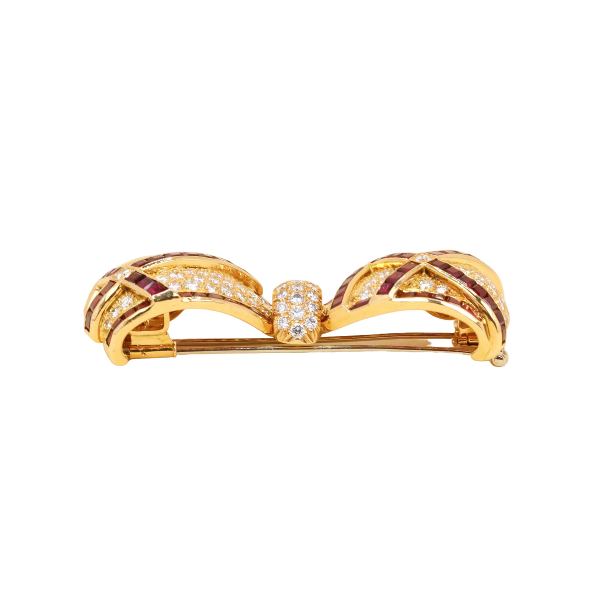 Broche Clip en or jaune, rubis et diamants