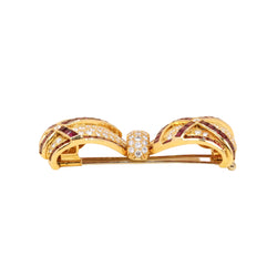 Broche Clip en or jaune, rubis et diamants