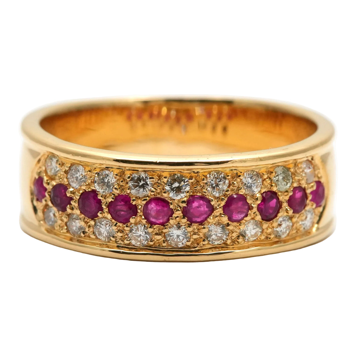 Bague Bandeau en or jaune, rubis et diamants