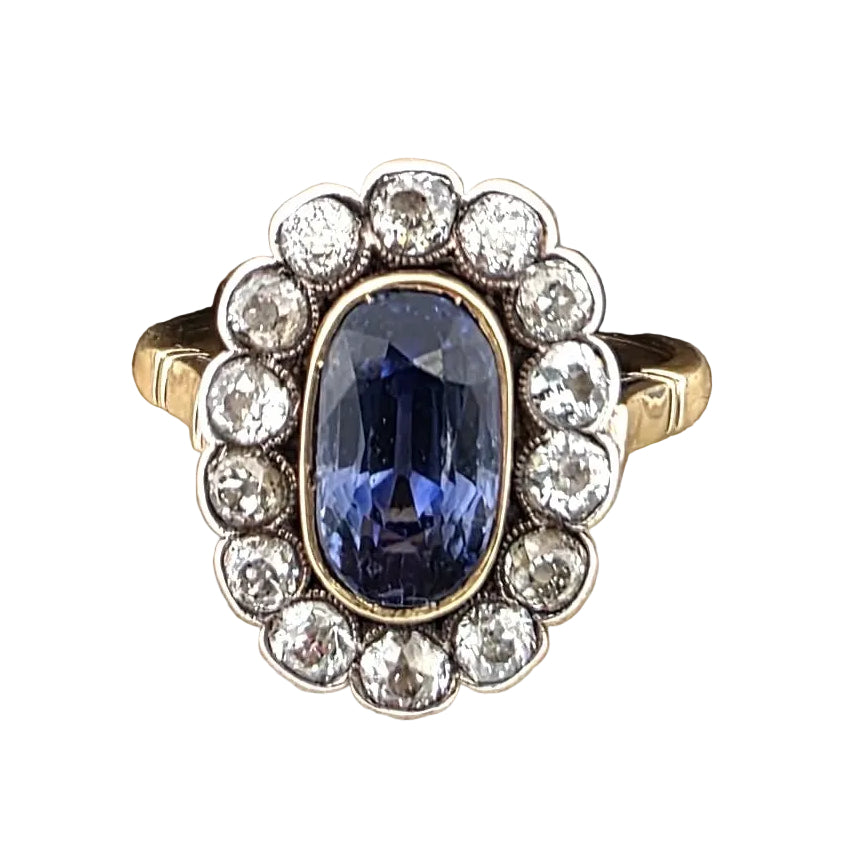 Bague Entourage en or jaune, argent, saphir et diamants