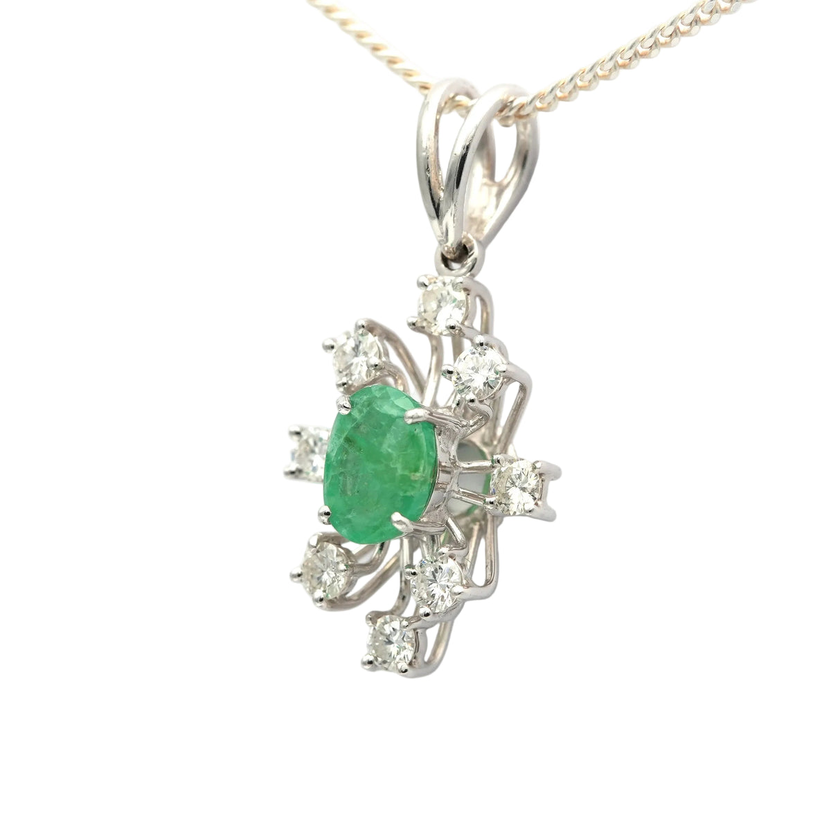 Pendentif en or blanc, émeraude et diamants