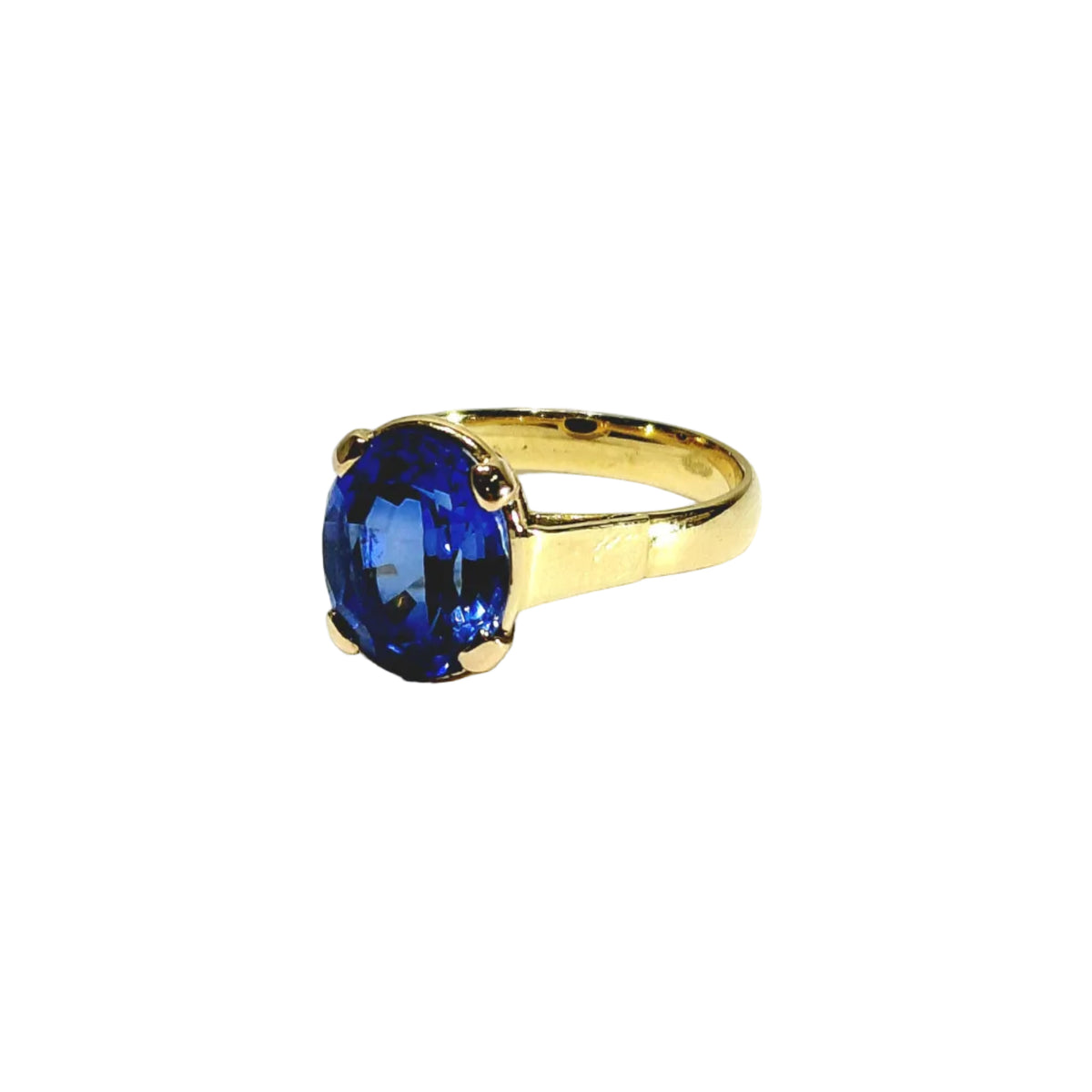 Bague en or jaune et saphir