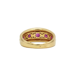 Bague Bandeau en or jaune, rubis et diamants