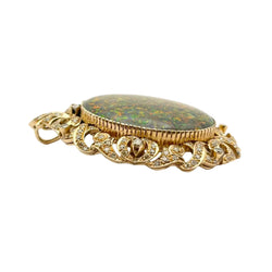 Pendentif en or jaune, opale et diamants