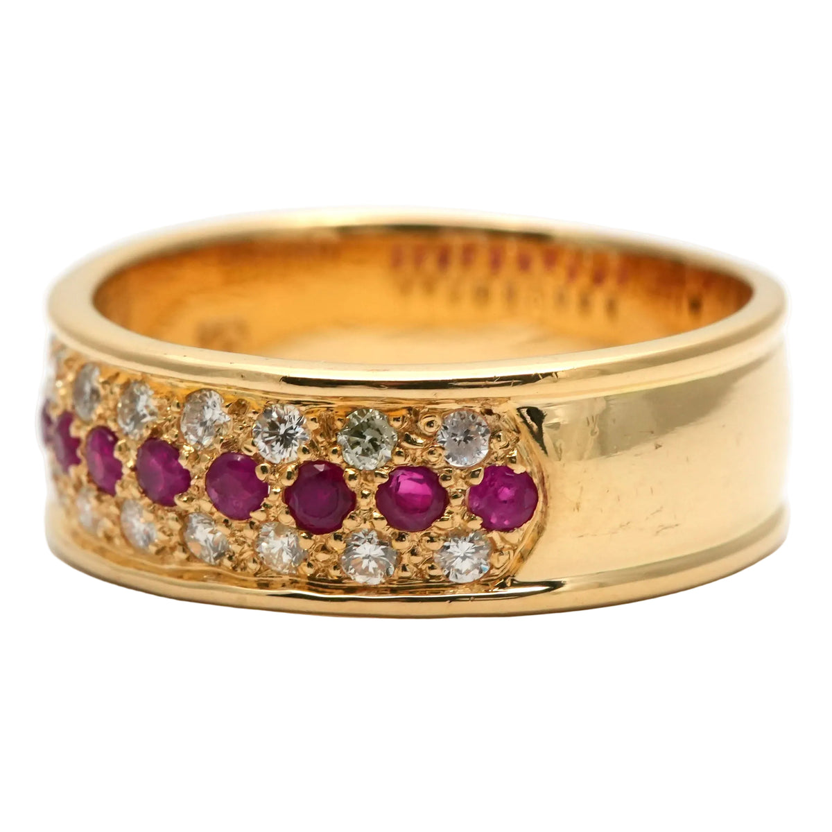 Bague Bandeau en or jaune, rubis et diamants